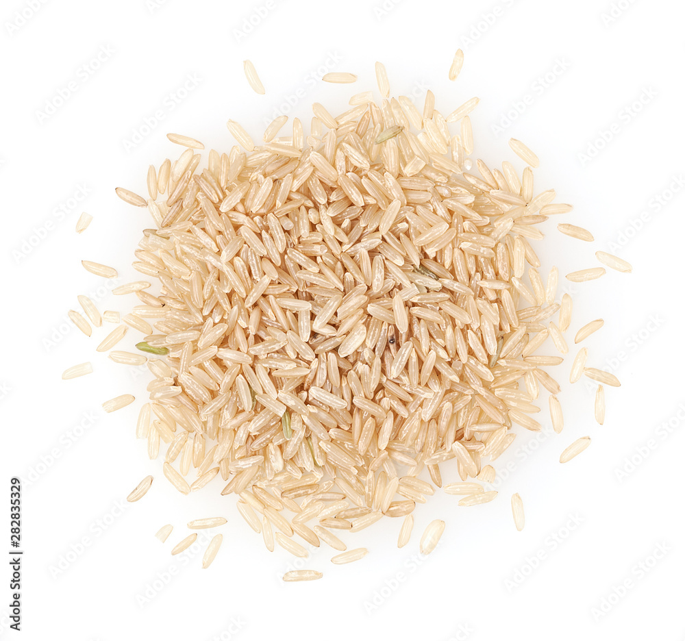Heap of brown rice isolated on white background - obrazy, fototapety, plakaty 