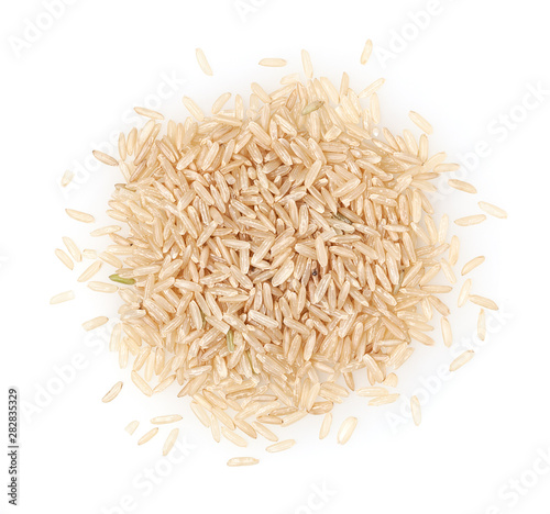 Obraz na płótnie Heap of brown rice isolated on white background w salonie