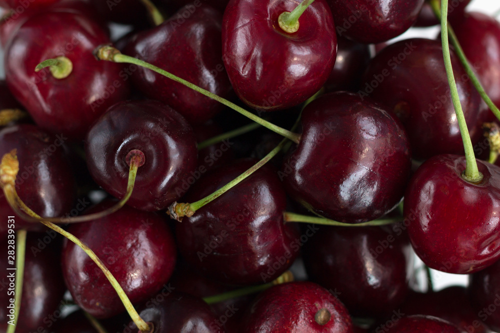 fresh red cherries in a bowl. cherries as background fresh red cherries in a bowl. cherries as background