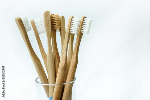 bamboo toothbrushes on white background. Place for text. Ecoproduct. eco-friendly