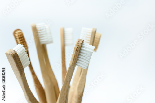 bamboo toothbrushes on white  background. Place for text. Ecoproduct. eco-friendly