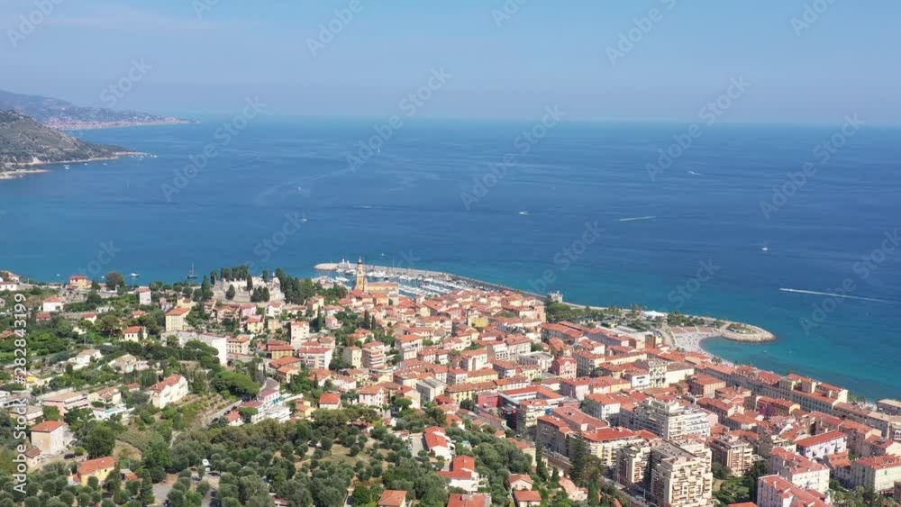 Aerial view city of Menton French Riviera harbour and basilica of Saint-Michel-Archange France Aerial view city of Menton French Riviera harbour and basilica of Saint-Michel-Archange France