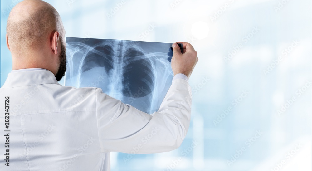 Fototapeta premium Close-up Doctor at hospital working with tablet pc