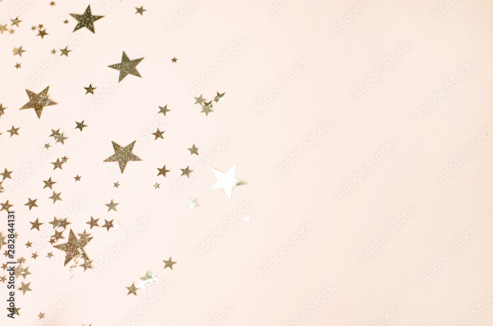 Light golden background with many shiny stars. Light golden background with many shiny stars.