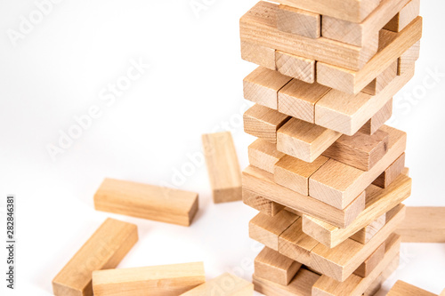 wood blocks tower game. planning  strategy and risk for business and finance. isolated background
