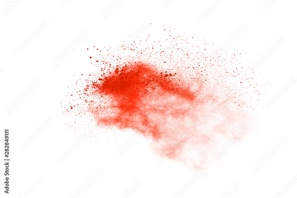 abstract orange powder splatted background,Freeze motion of color powder exploding/throwing color powder,color glitter texture on white background.