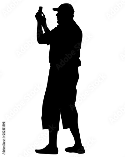 Man with a photo camera on white background