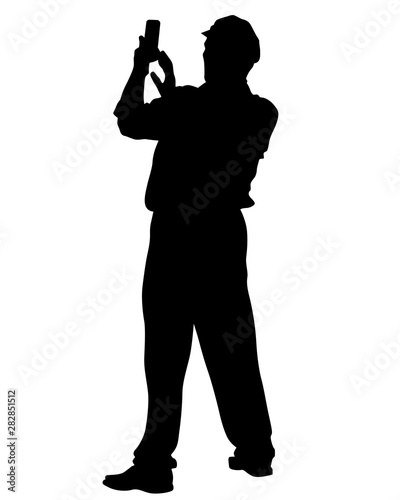 Man with a photo camera on white background