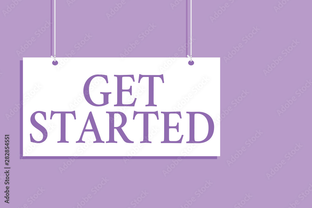 Fototapeta premium Writing note showing Get Started. Business photo showcasing asking someone to begin task endeavour or process right now Hanging board message communication open close sign purple background