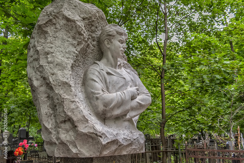 Monument to the Russian poet Sergei Yesenin on the Vagankovo Cemetery in Moscow. photo