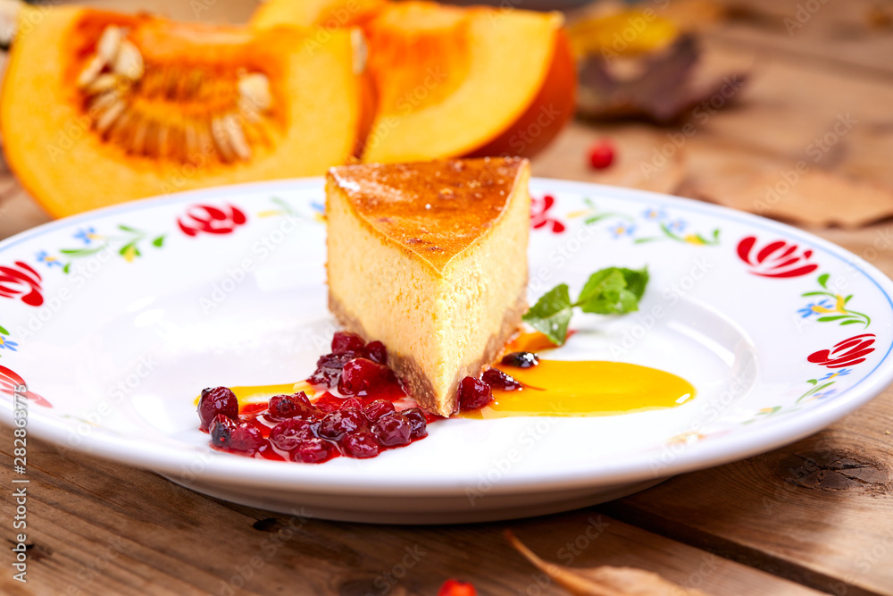 homemade pumpkin pie on the wooden background homemade pumpkin pie on the wooden background