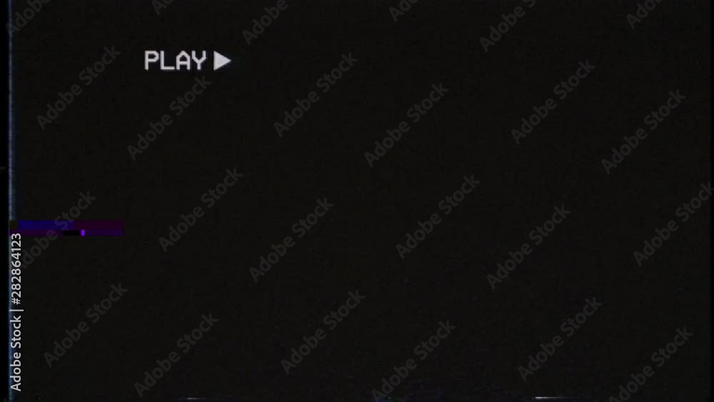 An old damaged VHS tape playing, over noise and glitch from an analog TV, with a PLAY text. Cool retro vintage background for modern videos. Infinite loop.