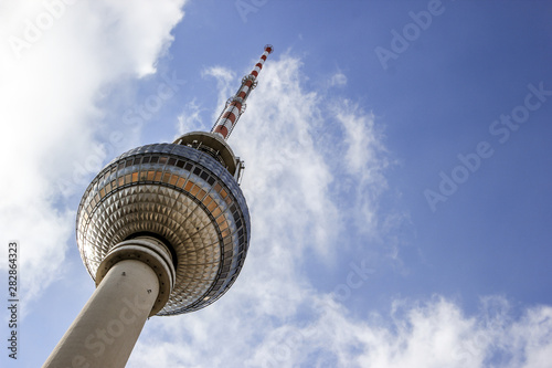 TV Tower located on the Alexanderplatz in Berlin, Germany. Photo take from the bottom looking up, urban cool colors.