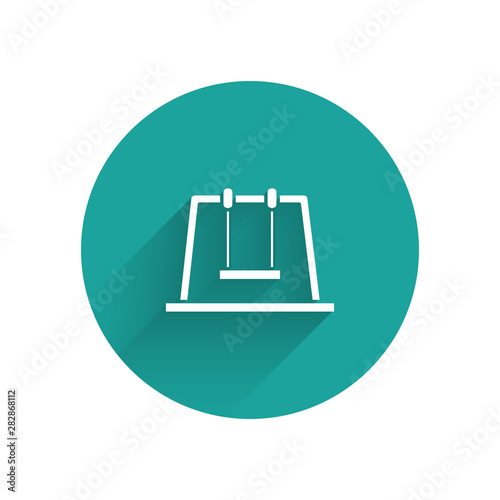 White Swing icon isolated with long shadow. Playground symbol. Green circle button. Vector Illustration