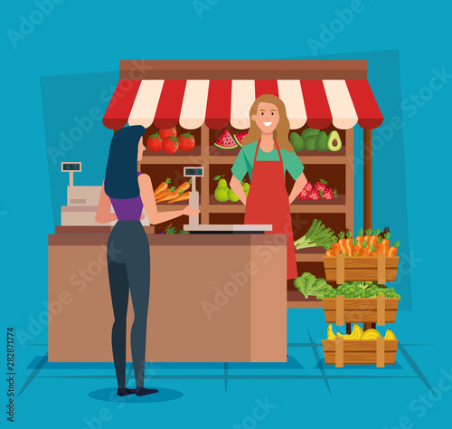 saleswoman in the natural store with woman customer