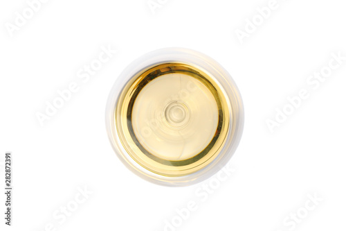 Glass with white wine isolated on white background, top view