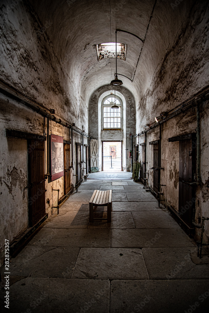 Prison corridor with cells on both sides