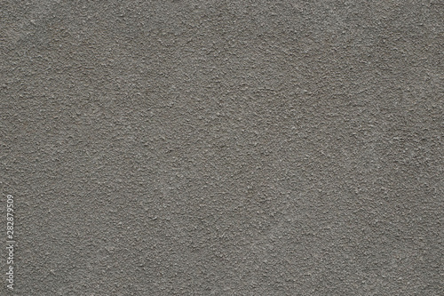 Fototapeta Naklejka Na Ścianę i Meble -  Full frame image of cement or concrete exterior wall with decorative relief. High resolution seamless texture for 3d models, background, pattern, poster, collage, gift wrap, wallpaper. Grunge style