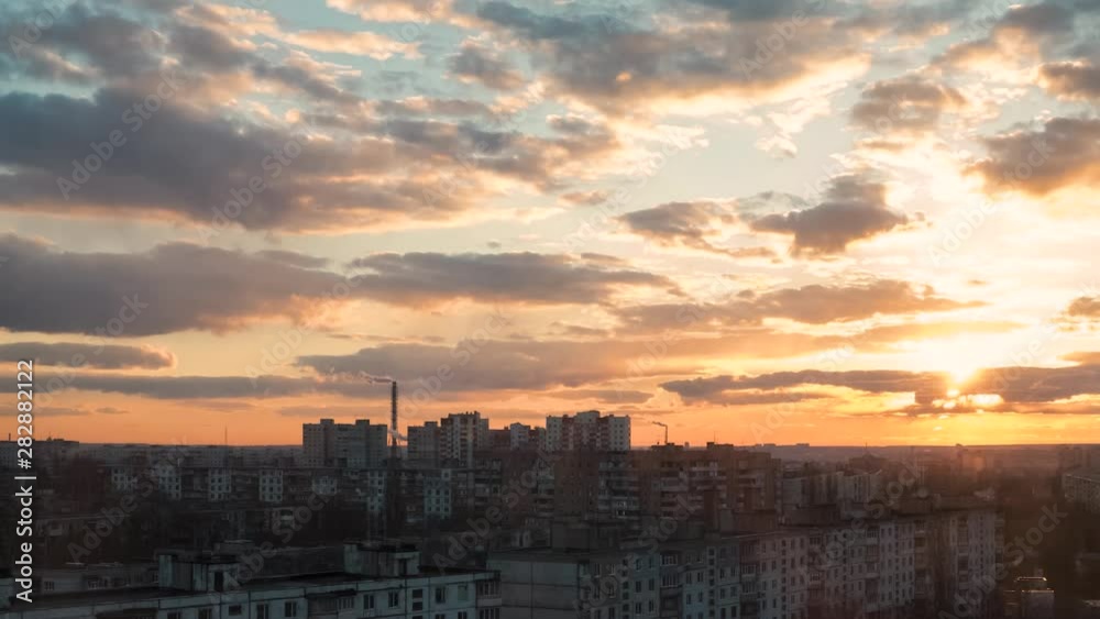 Timelapse video of beautiful sunset over the city with dramatic clouds Timelapse video of beautiful sunset over the city with dramatic clouds