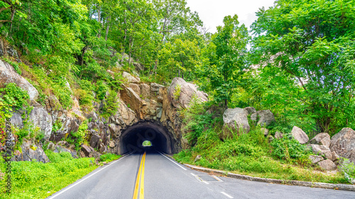 Tunnel through rocks along the skyline drive national park. photo