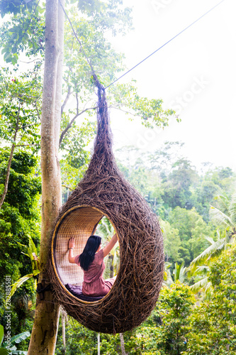 A female tourist is sitting...