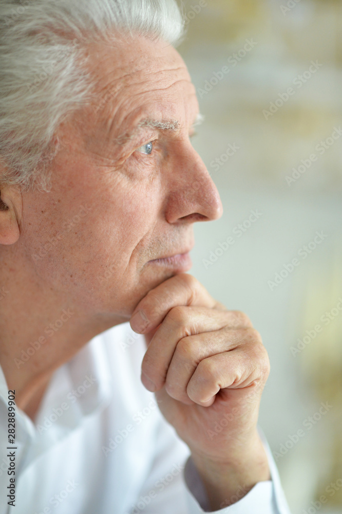 portrait of beautiful sad thinking senior man posing portrait of beautiful sad thinking senior man posing