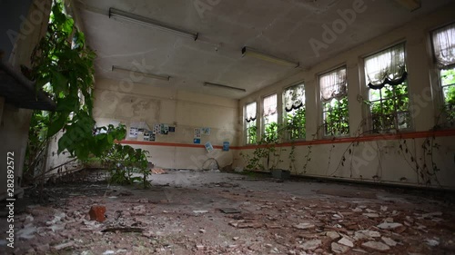 Abandoned Room WIth Debris And Ivy