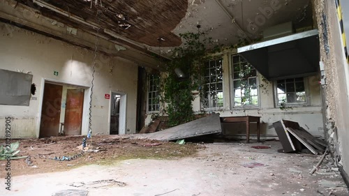 Abandoned Room WIth Debris And Ivy