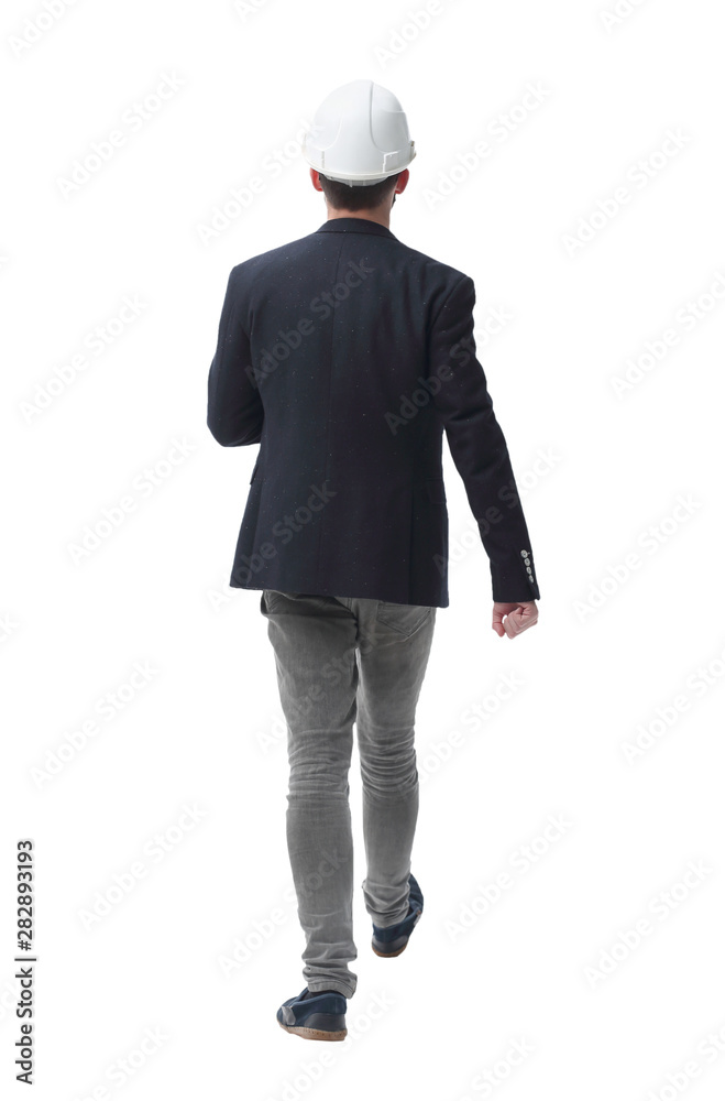 in full growth. male architect confidently stepping forward in full growth. male architect confidently stepping forward