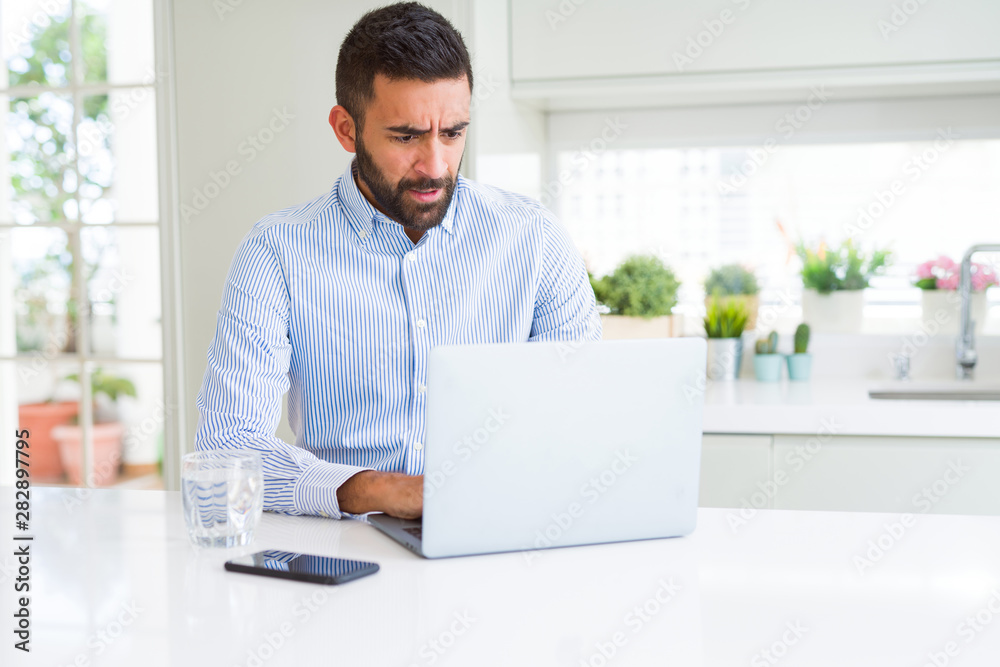 Business man concentrated working using computer laptop