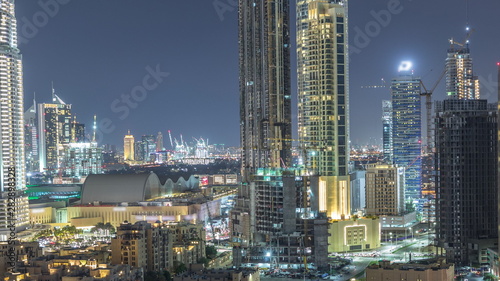Beautiful skyline of Dubai downtown and Business bay with modern architecture night timelapse. © neiezhmakov
