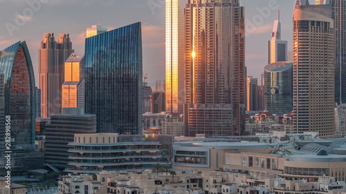 Aerial sunset cityscape with architecture of Dubai downtown timelapse, United Arab Emirates. © neiezhmakov