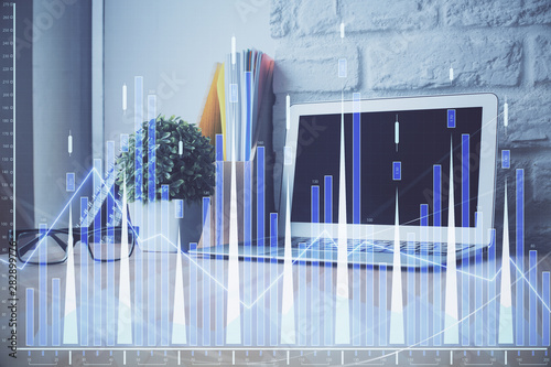 Financial market graph hologram and personal computer on background. Double exposure. Concept of forex.