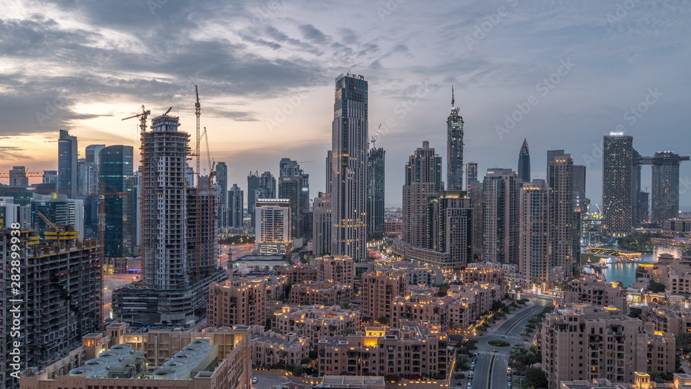 Dubai Downtown skyline during sunset timelapse with modern towers paniramic view from the top in Dubai Dubai Downtown skyline during sunset timelapse with modern towers paniramic view from the top in Dubai
