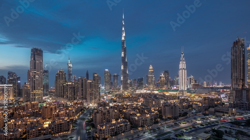 Dubai Downtown skyline day to night timelapse with Burj Khalifa and other towers paniramic view from the top in Dubai © neiezhmakov