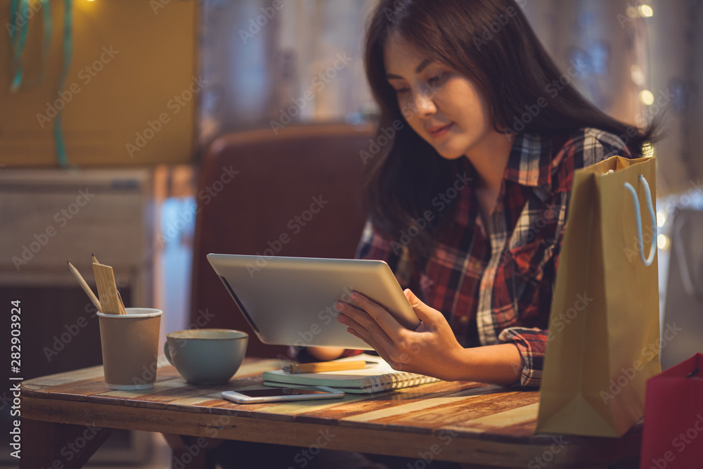 young woman with laptop in cafe young woman with laptop in cafe