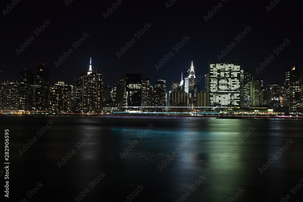 Long exposure mid town Manhattan East River