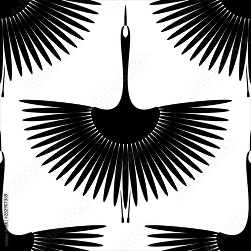 Flying bird. Swan. Seamless oriental pattern. Vector wallpaper.