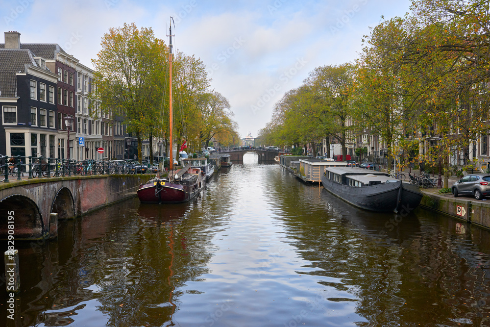 View of the canal in the autumn morning in Amsterdam.