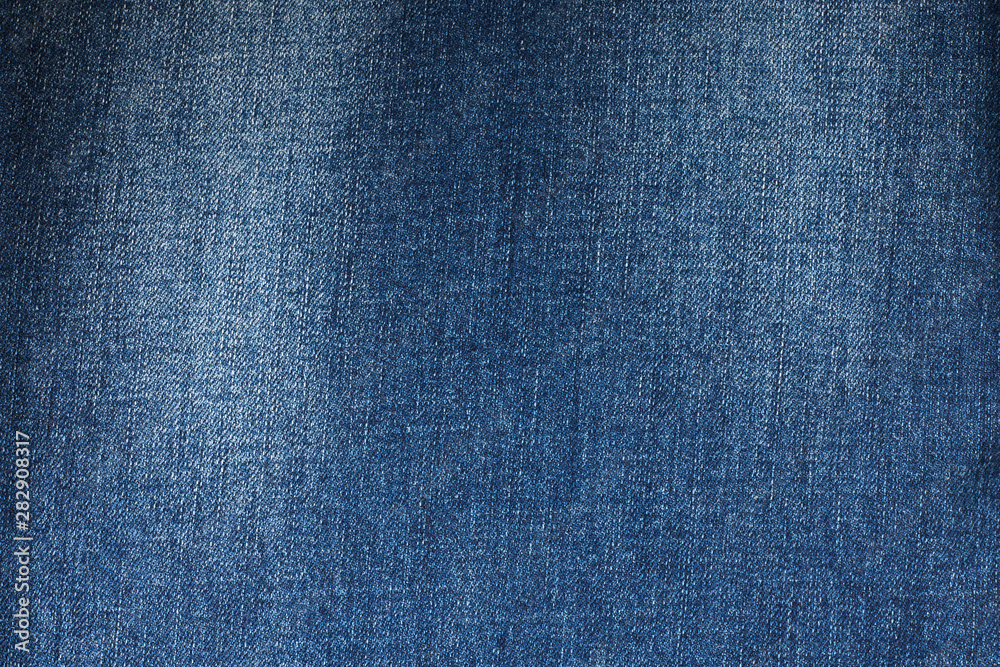 Fragment of the blue denim. Jeans background or texture. Fragment of the blue denim. Jeans background or texture.