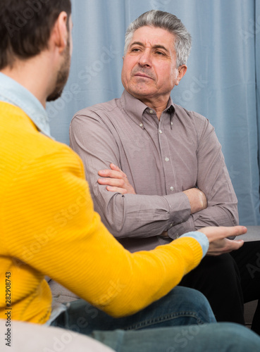 Принти на полотні Adult father and son solve problems