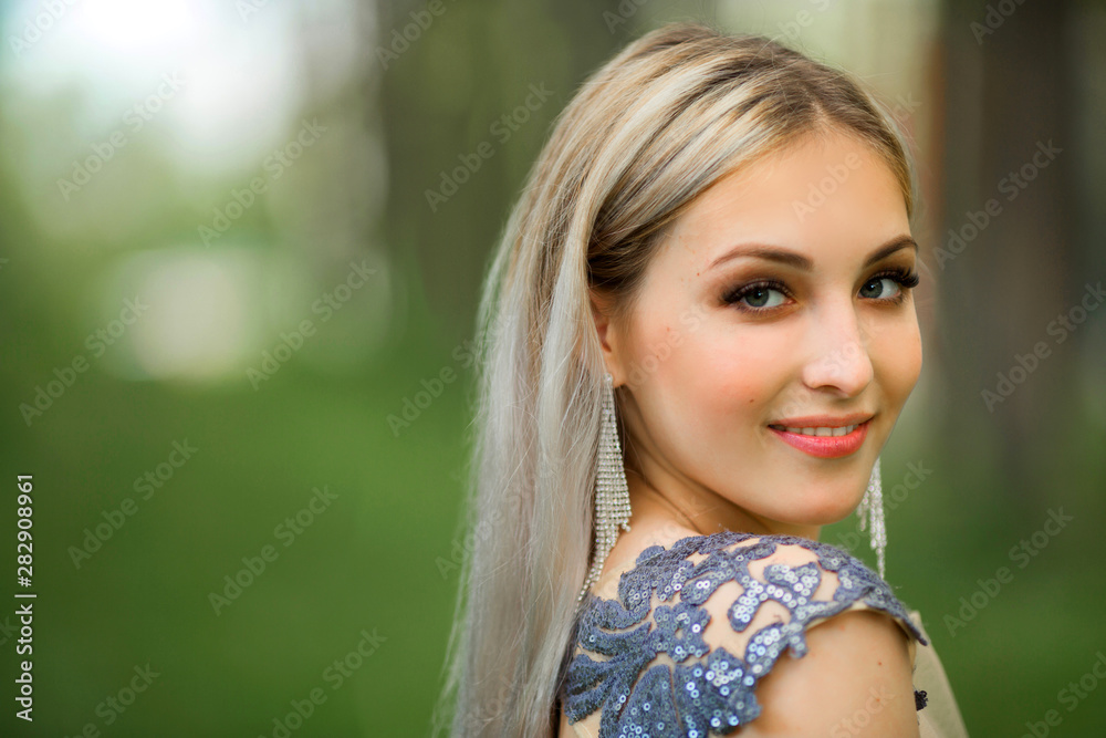 portrait of a beautiful young woman with makeup and hairstyle portrait of a beautiful young woman with makeup and hairstyle