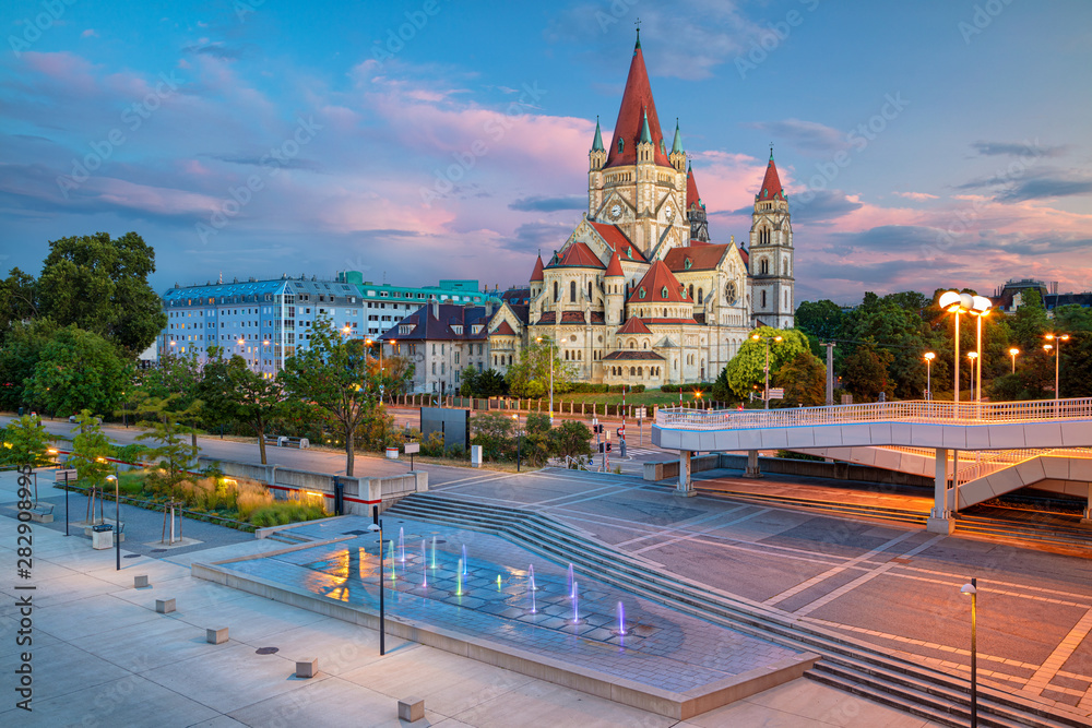 Vienna, Austria. Cityscape image of Vienna capital city of Austria with St. Francis of Assisi Church during beautiful sunset. - obrazy, fototapety, plakaty 