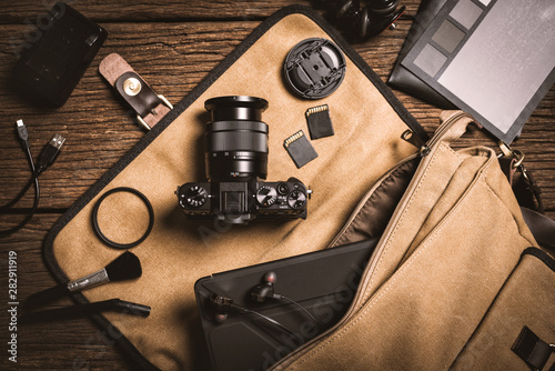 photography gear on wooden table photo