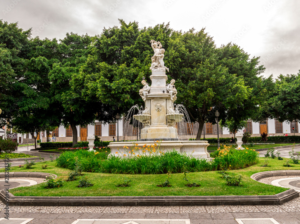A central fountain in Neo-Renaissance style located on Weyler Square at Santa Cruz de Tenerife, Canary Islands, Spain