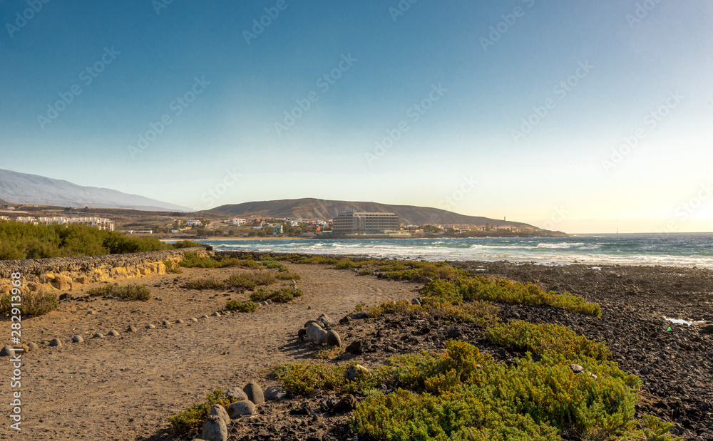A footpath along Playa del Cabezo beach near El Medano town, Tenerife, Spain