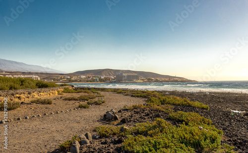 Obraz na płótnie A footpath along Playa del Cabezo beach near El Medano town, Tenerife, Spain w salonie