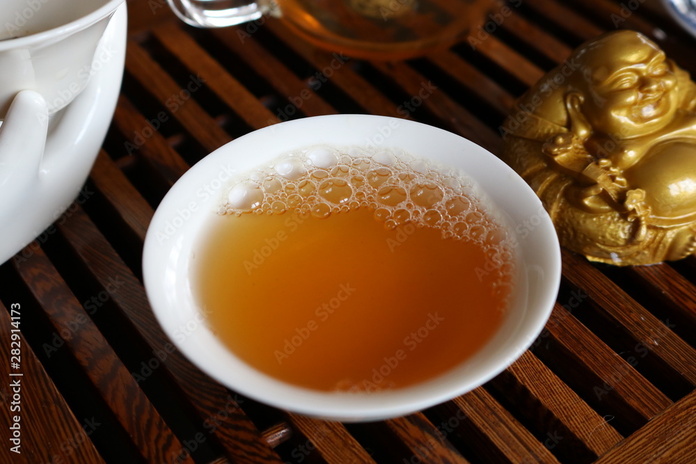 Chinese tea ceremony using tea utensils made of glass and porcelain. Chinese tea ceremony using tea utensils made of glass and porcelain.