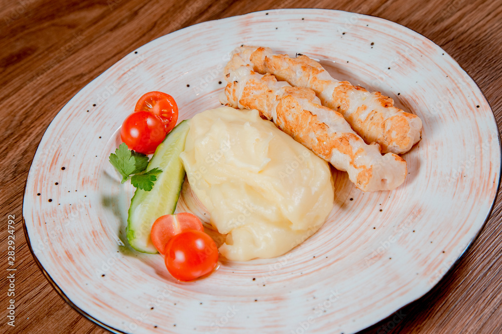Russian kitchen. Mashed potatoes with chicken kebab Russian kitchen. Mashed potatoes with chicken kebab