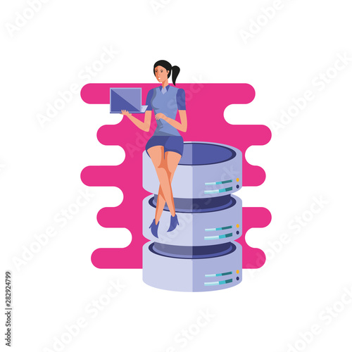 business woman sitting in data center disks with laptop